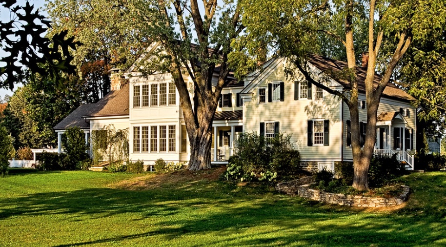 Landscape Courtyard Traditional Stunning Landscape Courtyard Outside The Traditional Yellow Home With Big Windows With Green Lawn And Big Trees Decoration Stunning Ancient Home Designs For Your Amazing Living Experiences