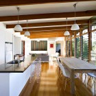 White Pendant Island Stunning White Pendant Above Kitchen Island And Wooden Dining Table Completed White Chairs Inside Storrs Road Residence Decoration Amazing Floating Deck Concept For Luminous Modern House