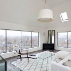 White Living The Terrific White Living Room Of The Water Tower Residence Installed With White Sofa And Glass Coffee Table On Tiled Rug Dream Homes An Old Water Tower Converted Into A Luminous Modern Home With Sliding Glass Walls