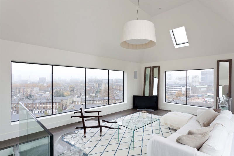 White Living The Terrific White Living Room Of The Water Tower Residence Installed With White Sofa And Glass Coffee Table On Tiled Rug Dream Homes An Old Water Tower Converted Into A Luminous Modern Home With Sliding Glass Walls