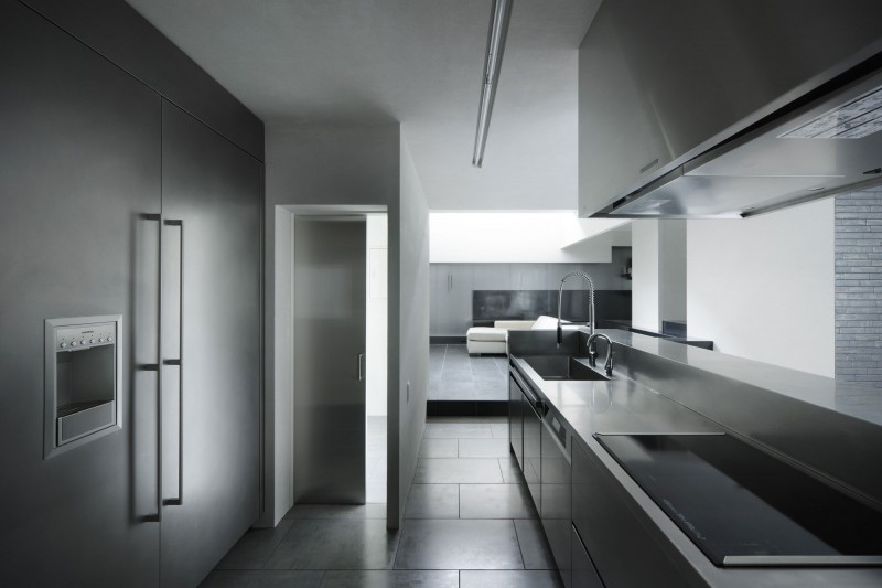 Narrowed House Kitchen Tight Narrowed House Of Silence Kitchen Enhanced With Floor To Ceiling Storage Cabinet And Bright Pantry Behind The Door Dream Homes Sophisticated Modern Japanese Home With Concrete Construction Of Shiga Prefecture