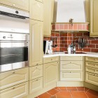Cream Themed Idea Tiny Cream Themed House Kitchen Idea Designed With Little Italian Accent With Brick Backsplash And Classic Hood Dream Homes Wonderful Modern Home With Verdant Garden Decorations