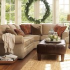 Home Family Designed Traditional Home Family Room Idea Designed With Cream Sofas And Sectionals And Brown Ottoman As Coffee Table Decoration Lavish Sofas And Sectionals For Cozy Living Room Appearance