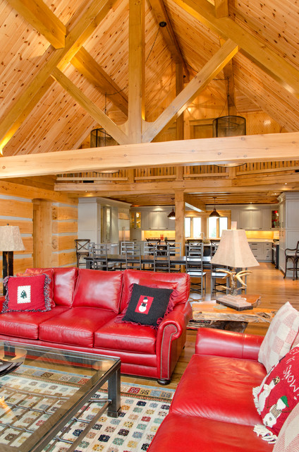Rustic Living Red Traditional Rustic Living Room With Red Sofas Facing Glass Table And Wood Rooftop Design Make Robust The House  Vibrant Red Sofas Inspirations To Give Your Living Room A Trendy