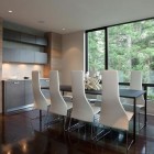 Chairs In Seat Unique Chairs In High Back Seat Colored In White With A Square Table In The Dining Room Of The Luxury Compass Pointe House Decoration Amazing Modern Rustic Home With Warm And Contemporary Interior Style (+16 New Images)