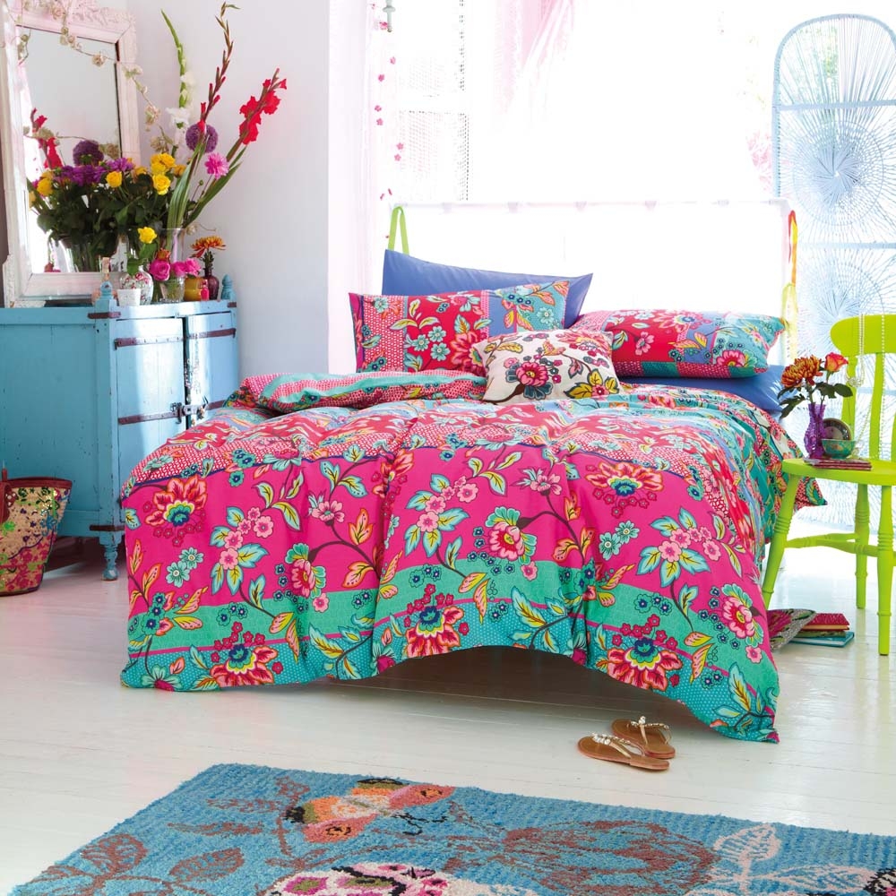 Pink Turqouise Duvet Unique Pink Turquoise Floral Patterned Duvet Cover Sets With Green Stools Installed On White Wooden Striped Glossy Floor Bedroom Exquisite Duvet Cover Sets For Sophisticated Contemporary Bedrooms