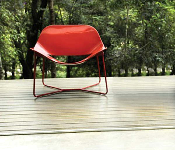 Red Lacquered On Vibrant Red Lacquered Chair Put On Home Deck As Furnishing While Enjoying The Lush Greenery Outside Of The House  Beautiful Lacquer Furniture With Hip And Glossy Surface