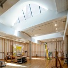 Studio Space Artist Wide Studio Space Inside The Artist Residence With Wooden Desk And Hardwood Floor Under Wide Ceiling Decoration Elegant Home Decorated With Artistic And Contemporary Living Spaces