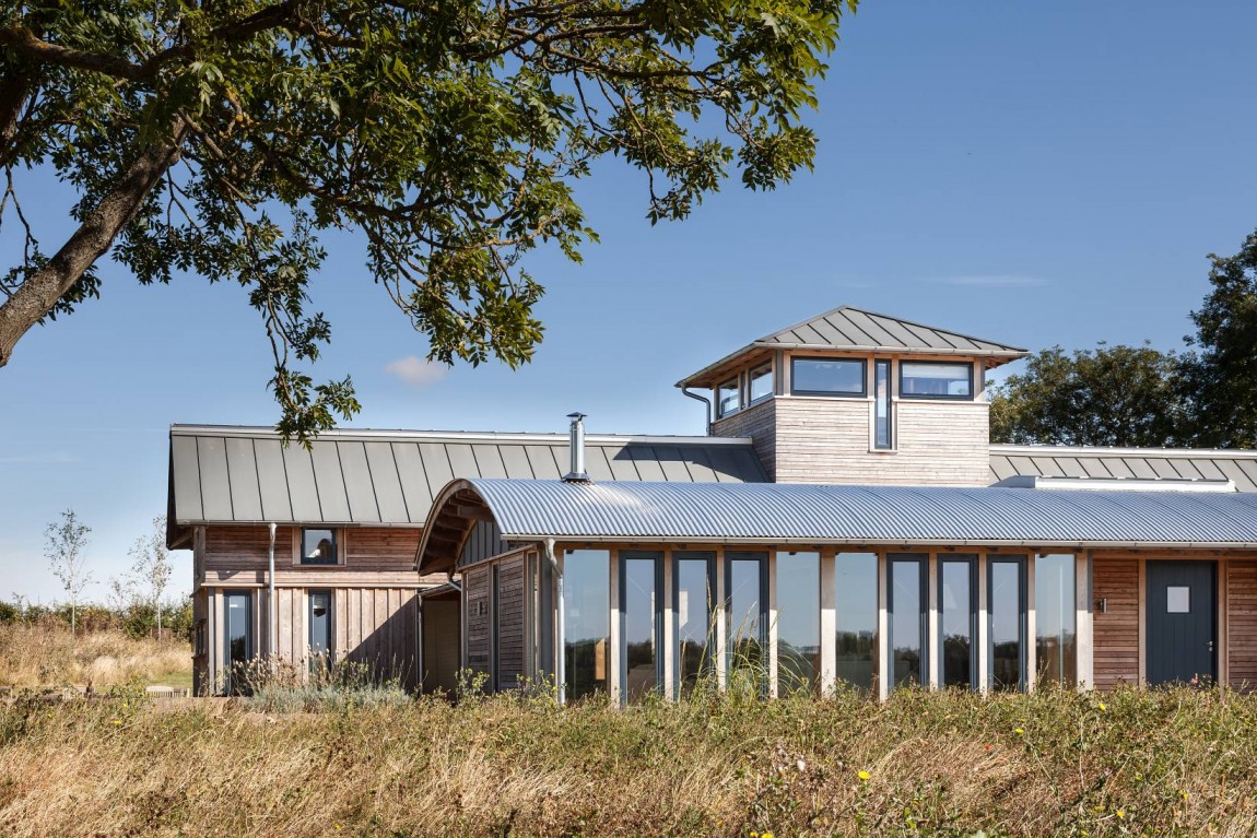 And Rustic The Wild And Rustic Vegetation Surrounded The Allies Farmhouse View From Outside That Applied Floor To Ceiling Window Architecture Stunning Rustic Contemporary Home With Bright Interior Accents