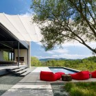 Backyard Deck Burton Wonderful Backyard Deck Design At Burton Residence With Swimming Pool And Red Sofa That Make Accents Dream Homes Beautiful Modern Home Furnished With Bright Colorful Accents (+10 New Images)