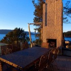 Chimney With It Wonderful Chimney With Fireplace On It Installed Outside Seaside House Terrace Involved Outdoor Dining Table And Chairs Dream Homes Beautiful Seaside Home With Classic And Vintage Decorations