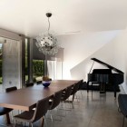 Dining Room Family Wonderful Dining Room In Modern Family Residence With Brown Chairs And Long Wooden Table Under Bubble Lamps Dream Homes Duplex Contemporary Concrete Home With Outdoor Green Gardens For Family (+19 New Images)