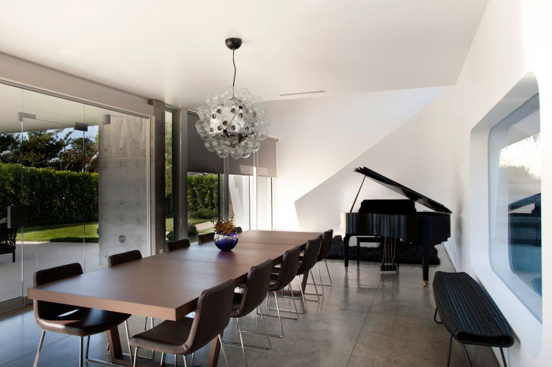 Dining Room Family Wonderful Dining Room In Modern Family Residence With Brown Chairs And Long Wooden Table Under Bubble Lamps Fireplace Duplex Contemporary Concrete Home With Outdoor Green Gardens For Family