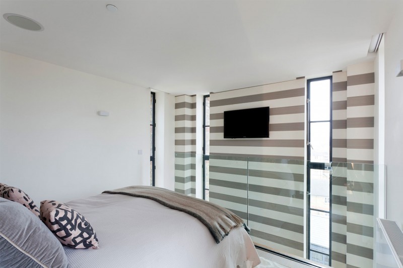 Light Gray Striped Wonderful Light Gray And White Striped Entertainment Wall Of The Water Tower Residence Bedroom Completed Glass Windows Dream Homes  An Old Water Tower Converted Into A Luminous Modern Home With Sliding Glass Walls