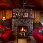 Living Room Sofas Wonderful Living Room With Red Sofas That Wooden Math Table Beside The Fire Place Which Giving Comfy The Area Decoration Vibrant Red Sofas Inspirations To Give Your Living Room A Trendy