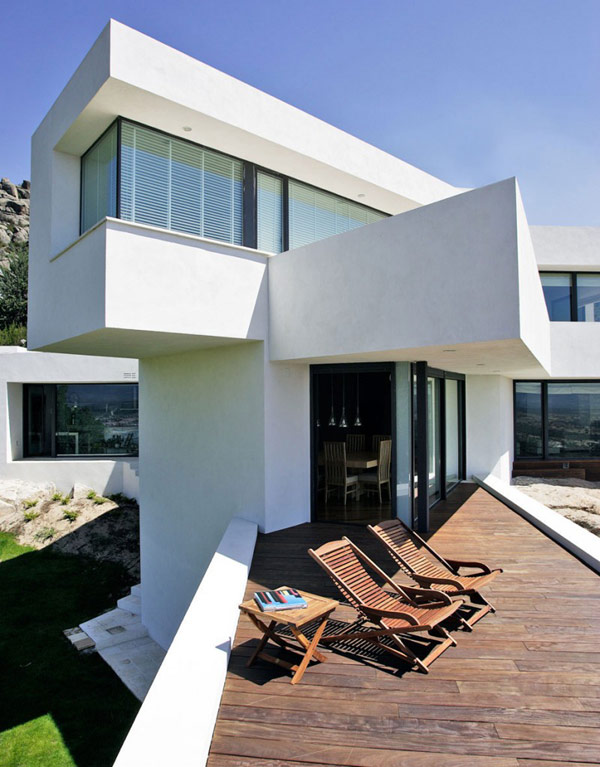 Modern Residence House Wonderful Modern Residence El Viento House Design Exterior With Wooden Flooring And Wooden Chair Furniture Ideas  Beautiful Mountain Home With Stunning Modern Concrete Construction