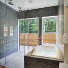 Bathroom In Hill Attractive Bathroom In The Qual Hill House With White Tub And Glass Shower Space Under The White Ceiling Architecture Striking And Creative Modern Home With Personal Art Galleries