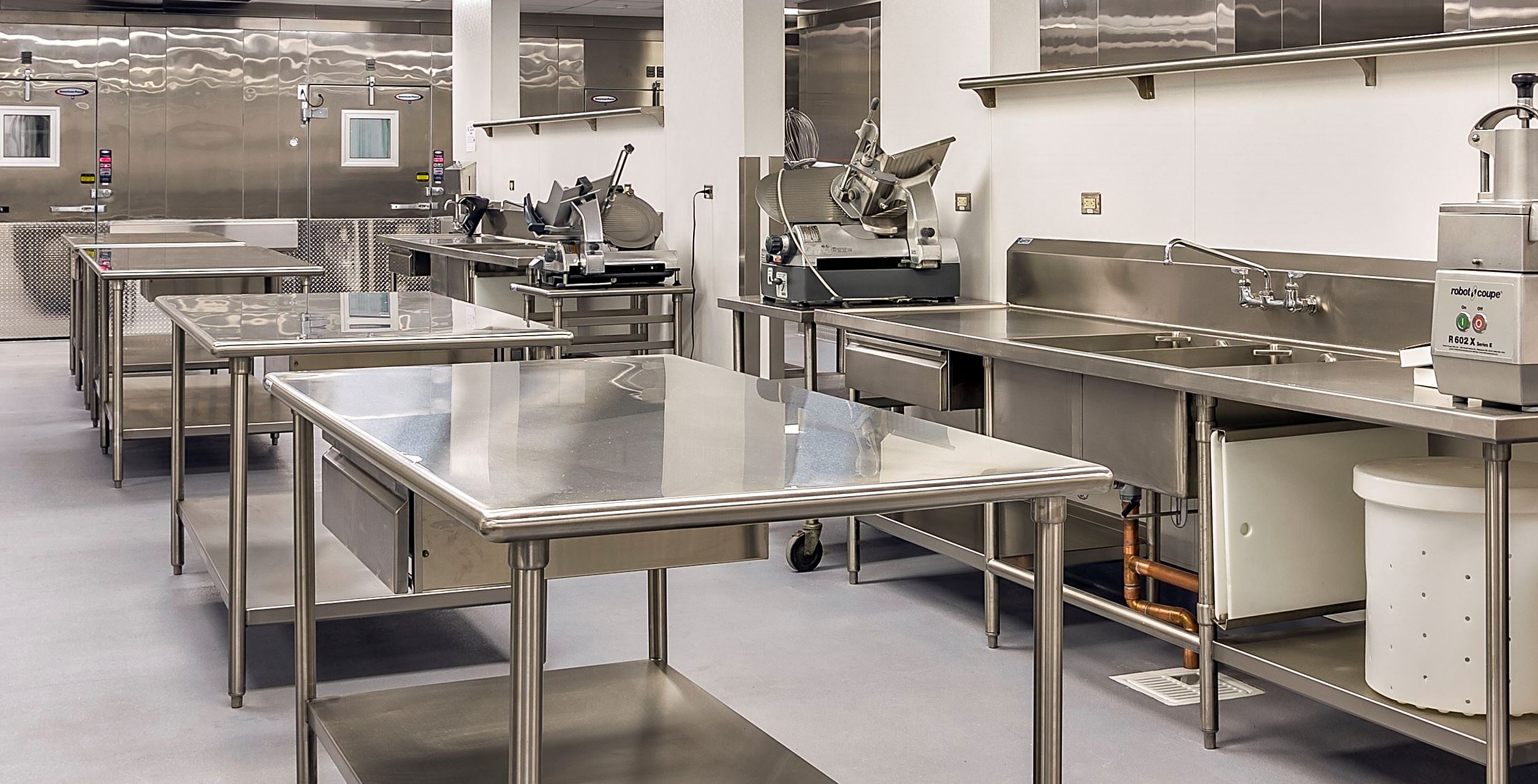 Stainless Steel In Attractive Stainless Steel Kitchen Tables In Wide Industrial Kitchen With Glossy Counter And Wide Sink Kitchens Effective Stainless Steel Kitchen Tables For Commercial Kitchen