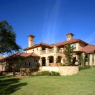 Mediterranean House Rough Awesome Mediterranean House Exterior With Rough Stone Wall And Wide Grassy Yard As Impressive Sustainable Home Plans Architecture Warmth Contemporary Sustainable Home With Neat Garden Arrangements