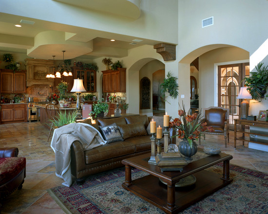 Mediterranean Family Cozy Charming Mediterranean Family Room With Cozy Leather Sofa And Wood Coffee Table Tribal Pattern Carpet Natural Greenery Sustainable Home Plans Architecture Warmth Contemporary Sustainable Home With Neat Garden Arrangements