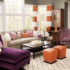 Cream Patterned On Classic Cream Patterned Rug Put On Dark Flooring Enhanced With Purple Velvet Chaise Orange Stools And Cool Pillows Decoration Spectacular Home Interior Design With Vibrant Rug And Patterns