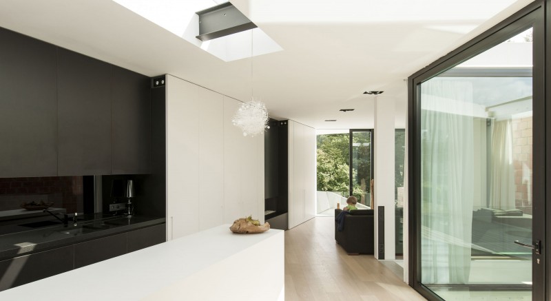 House K Precious Classy House K Interior With Precious Pendant Light Flashy White Kitchen Island Glossy Dark Kitchen Cabinet Glass Door Dream Homes Stunning Contemporary House With Bright Black And White Colors