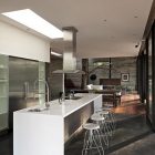 Setting Of By Clean Setting Of Corallo House By Paz Arquitectura Galley Kitchen Idea With Floor To Ceiling Cabinet And Island Architecture Natural Concrete Home With Wooden Floor And Glass Skylight