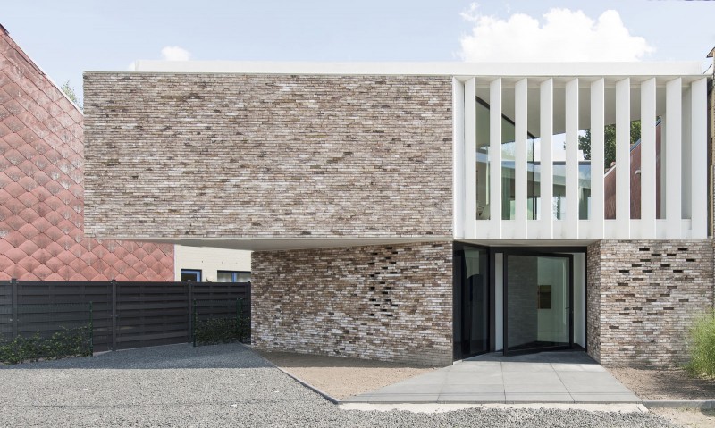 Architectural House Stone Contemporary Architectural House K Mosaic Stone Outdoor Wall Swing Glass Door Geometric Concrete Floor At Entrance Dream Homes Stunning Contemporary House With Bright Black And White Colors