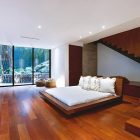 Corallo House Arquitectura Contemporary Corallo House By Paz Arquitectura Bedroom Suite Interior Furnished With Platform Bed Facing Dresser Architecture Natural Concrete Home With Wooden Floor And Glass Skylight