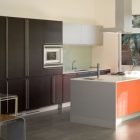 Kitchen Combined Black Cool Kitchen Combined With The Black Cabinet And Orange Kitchen Cabinet With White Countertop To Decorate The Kuhlhaus 02 Home Dream Homes Bright Modern Minimalist Home Inspired By Delightful Interior Atmosphere