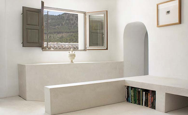 White Painted In Cool White Painted Artists Retreat In Andalucia Spain Interior Furnished With Patented Bookcase And Bench For Seating Apartments Picturesque Contemporary Farmhouse In Beautiful Stone And White Interiors
