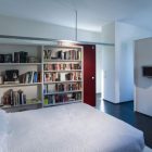 Bedroom With Dark Cozy Bedroom With Large Bookcase Dark Laminate Flooring Cushy White Bed With Soft Textured Quilt Shiny Bedside Tables Architecture Marvelous Contemporary Wooden House With Fancy Terrace With Railings