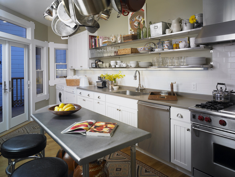 Round Stools Steel Cozy Round Stools And Stainless Steel Kitchen Tables Near White Counter And Grey Countertop Kitchens Effective Stainless Steel Kitchen Tables For Commercial Kitchen