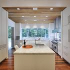 White Kitchen Hill Fascinating White Kitchen In Qual Hill House With Long Island And White Stools On Hardwood Floor Architecture Striking And Creative Modern Home With Personal Art Galleries