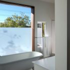 White Bathtub Bathroom Glossy White Bathtub In Small Bathroom Of Like A Houseboat Residence Frosted Glass Window Compact White Bathroom Vanity Architecture Marvelous Contemporary Wooden House With Fancy Terrace With Railings