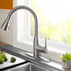 White Framed Stainless Interesting White Framed Window Beside Stainless Steel Kitchen Faucet And Glossy Sink Near White Backsplash Kitchens 10 Stainless Steel Kitchen Faucet To Complement The Functionality