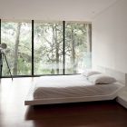 Corallo House Arquitectura Large Corallo House By Paz Arquitectura Master Bedroom Interior Painted In White With Transparent Wall For Forest Architecture Natural Concrete Home With Wooden Floor And Glass Skylight