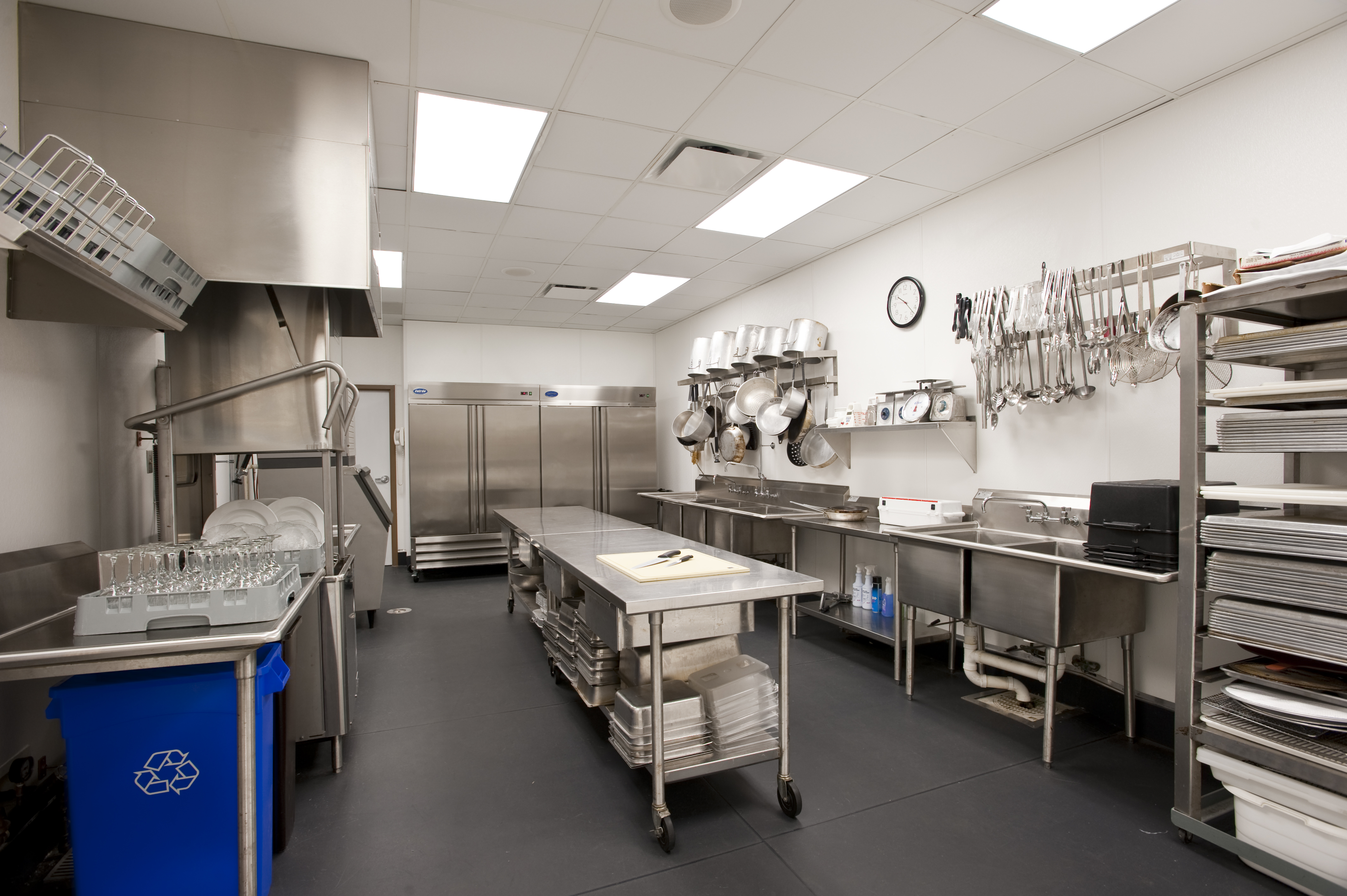 Stainless Steel In Long Stainless Steel Kitchen Tables In Stylish Industrial Kitchen With Grey Flooring And White Wall Kitchens Effective Stainless Steel Kitchen Tables For Commercial Kitchen