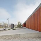 Facade View House Minimalist Facade View Of The House In Villarcaya With Wooden Wall And Concrete Floor In The Roadside Architecture Chic Spanish Home Design With Grey Concrete Floors