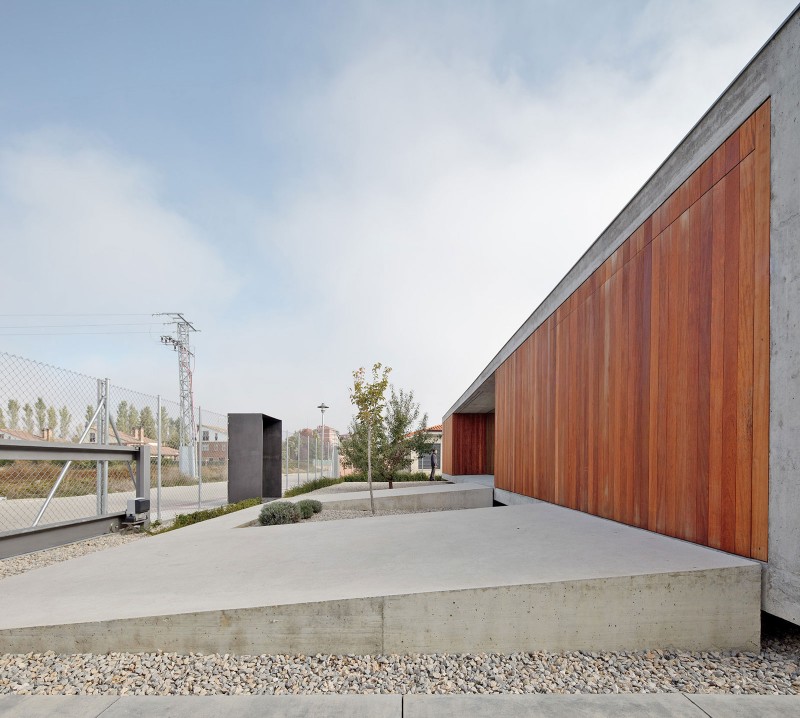 Facade View House Minimalist Facade View Of The House In Villarcaya With Wooden Wall And Concrete Floor In The Roadside Architecture Chic Spanish Home Design With Grey Concrete Floors