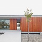 Wooden Wall House Natural Wooden Wall In The House In Villarcaya Exterior With The Concrete Terrace And Pebble Space Architecture Chic Spanish Home Design With Grey Concrete Floors