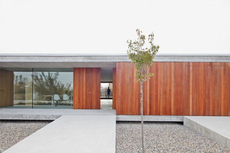 Wooden Wall House Natural Wooden Wall In The House In Villarcaya Exterior With The Concrete Terrace And Pebble Space Architecture Chic Spanish Home Design With Grey Concrete Floors