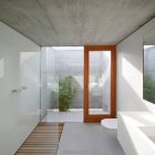 Bathroom In In Simple Bathroom In The House In Villarcaya With White Sink And Glass Shower Space Under Concrete Ceiling Architecture Chic Spanish Home Design With Grey Concrete Floors