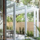 Covered Porch Modern Sleek Covered Porch Design At Modern House With Glass Roof Decorated With Modern Outdoor Furniture Architecture Sleek And Bright Contemporary Home With Cool Glass-Roofed Pergola