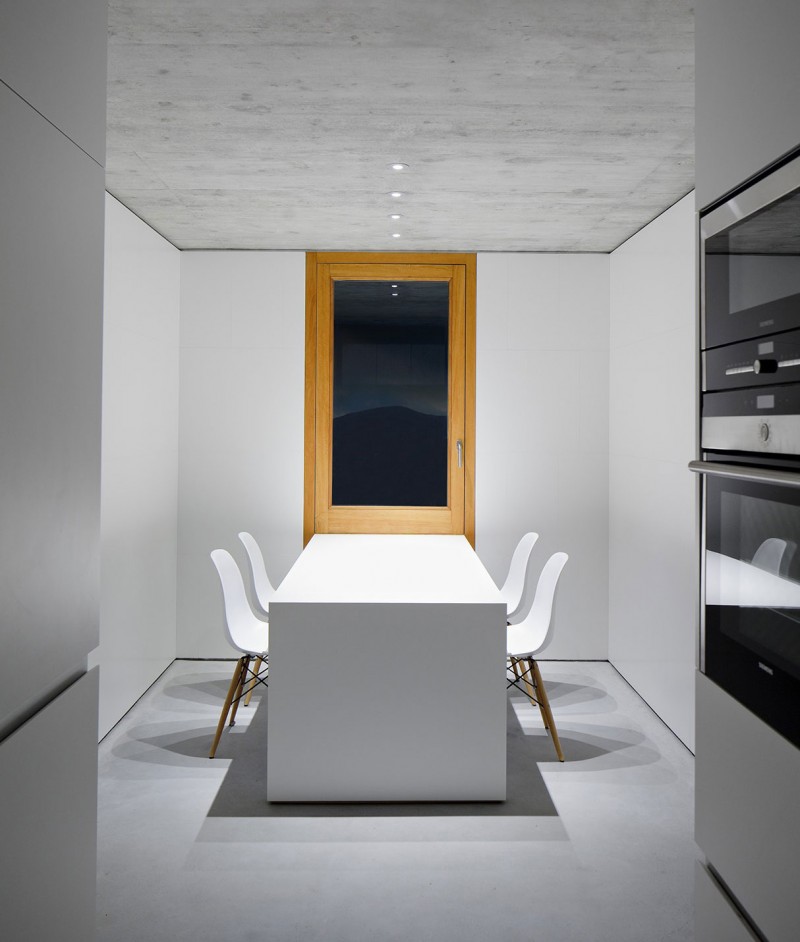 House In Room Small House In Villarcaya Dining Room With White Chairs And White Table Near The Modern Kitchen Architecture Chic Spanish Home Design With Grey Concrete Floors