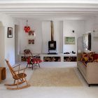 White Painted In Spacious White Painted Artists Retreat In Andalucia Spain Living Room Warmed Up By Fireplace With Firewood Storage Apartments Picturesque Contemporary Farmhouse In Beautiful Stone And White Interiors