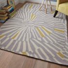 Setting Of Pattern Uncommon Setting Of Swirly Striped Pattern Displayed On The Soft Purple Rug On Sleek Wooden Floor With Seating Set Decoration Spectacular Home Interior Design With Vibrant Rug And Patterns