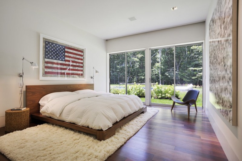 Wooden Bed Quilt Wide Wooden Bed And White Quilt In The Qual Hill House Bedroom With Brown Bedside Tables Architecture  Striking And Creative Modern Home With Personal Art Galleries