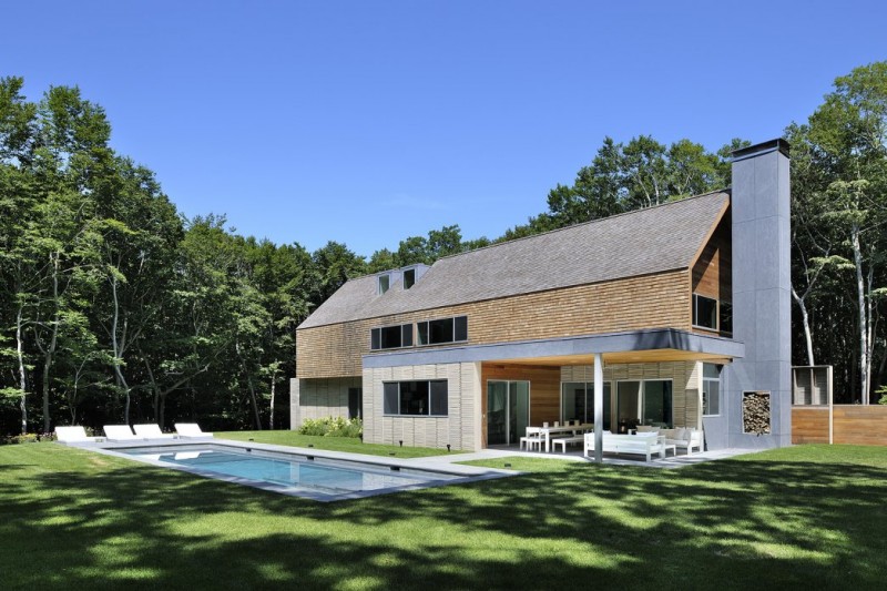 Back Space The Wonderful Back Space View Of The Qual Hill House With Blue Pool And Cozy Sitting Space Near It Architecture Striking And Creative Modern Home With Personal Art Galleries