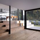Wooden Floor With Appealing Wooden Floor Design Ideas With Glass Door Design Showing Outside View At The Zochental Residence Architecture Creative Glass Facade Of Unconventional Contemporary House Appearance
